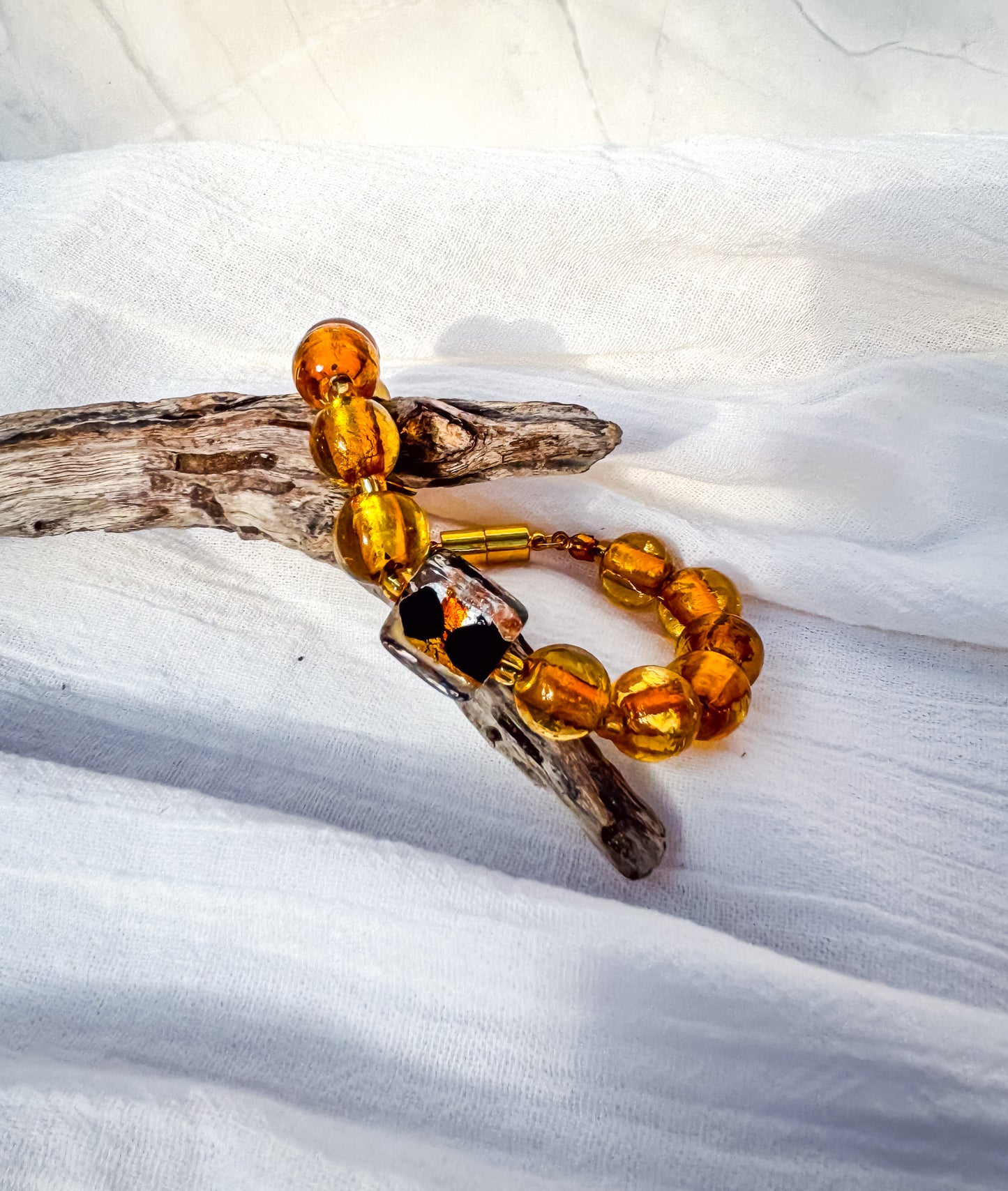 Amber Glass Bead Bracelet with Square Black & Clear Feature Bead