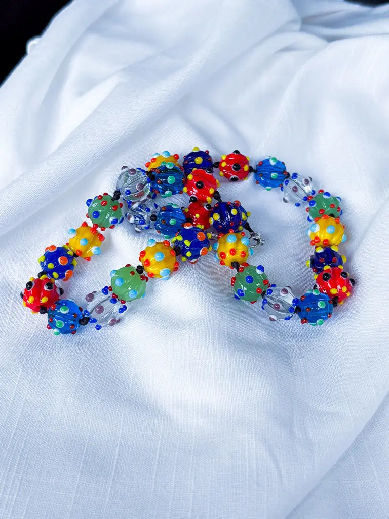 Round and blue rainbow spikey beaded necklace - Beadsmith