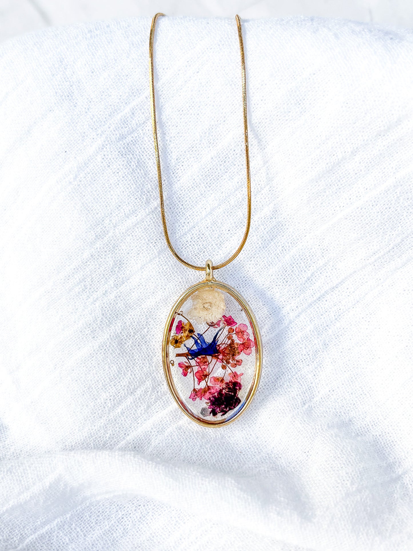 Gold Plated Brass oval with real flowers on 18k gold chain - Beadsmith