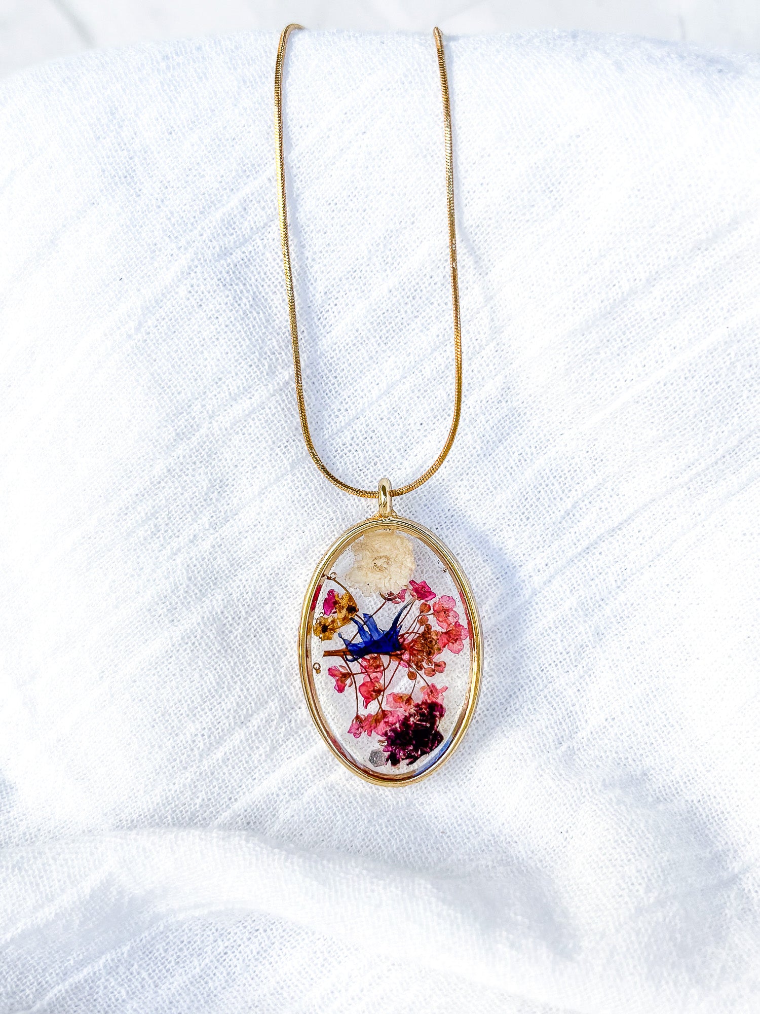 Gold Plated Brass oval with real flowers on 18k gold chain - Beadsmith