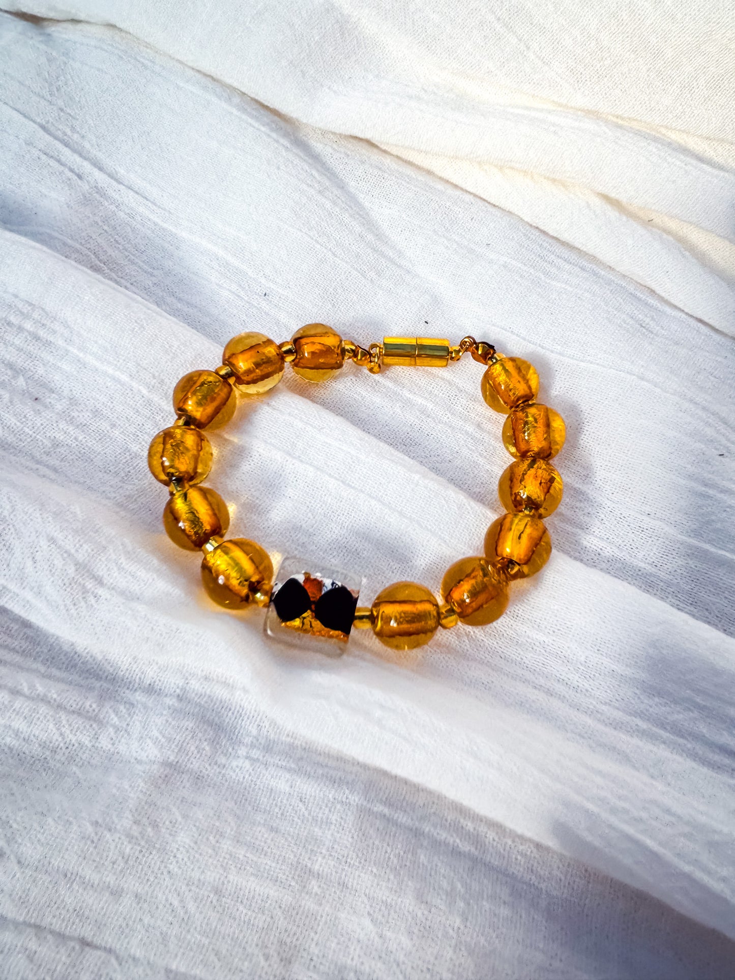Amber Glass Bead Bracelet with Square Black & Clear Feature Bead