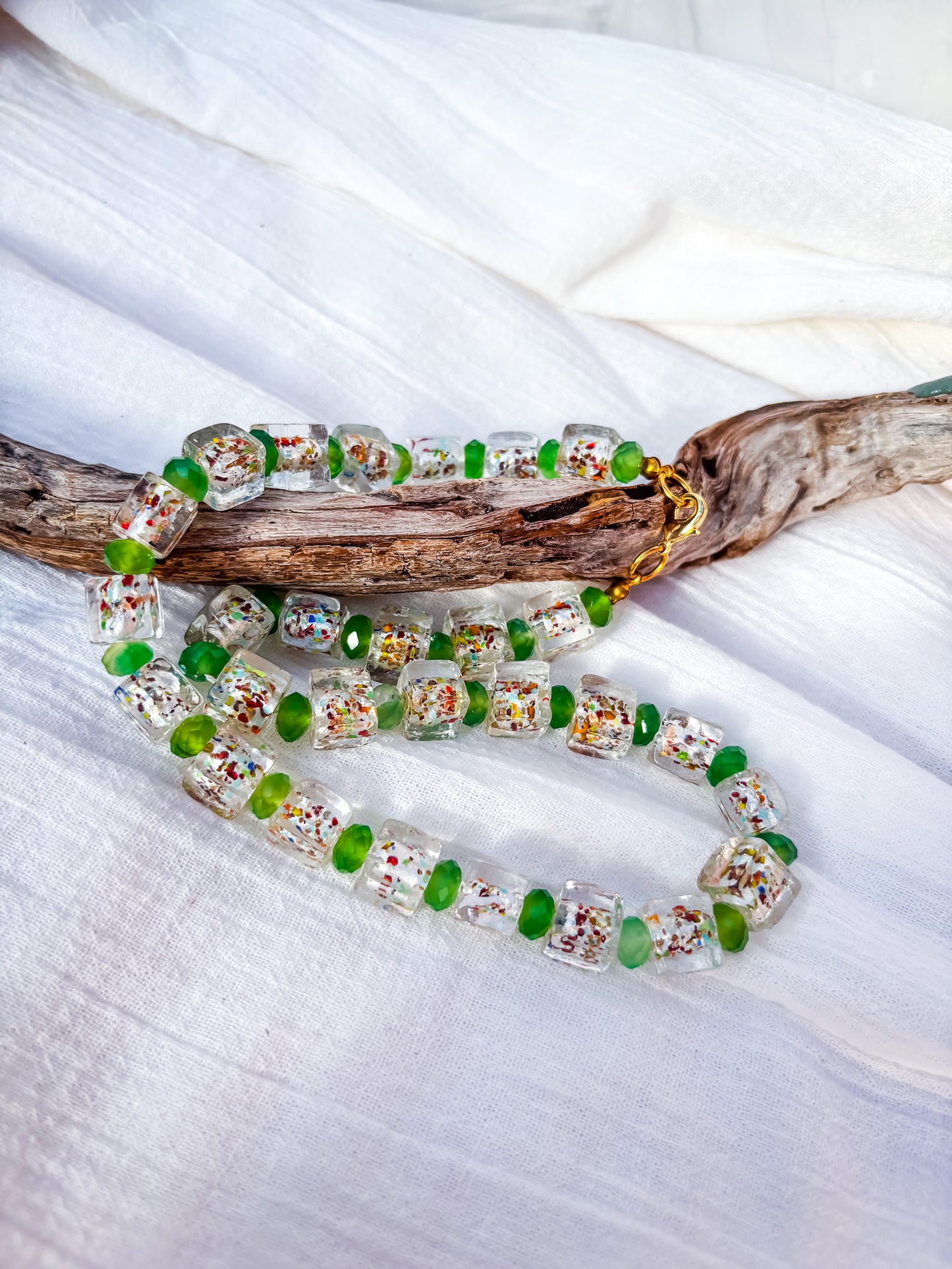 Clear Glass Rainbow-Speckled Beaded Necklace with Faceted Green Frosted Spacers
