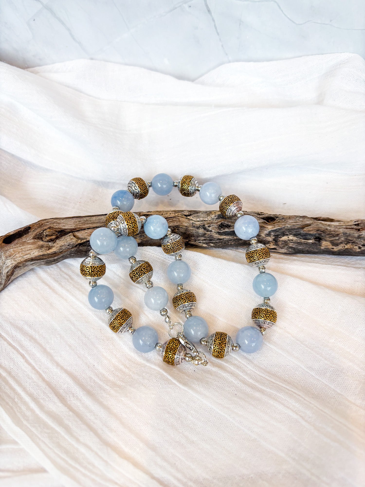 Pale blue and metal detailed round bead short necklace - Beadsmith