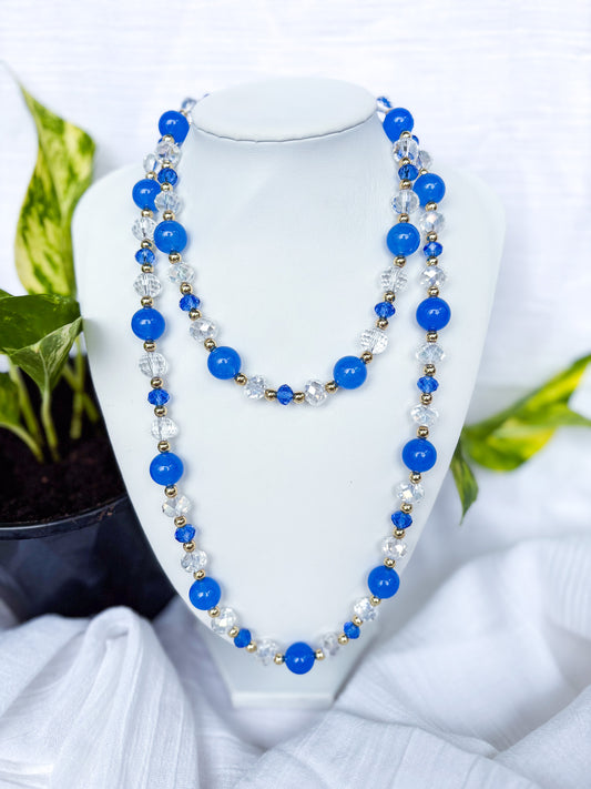Handmade blue and clear faceted long Crystal Beaded Necklace with gold spacer beads - Beadsmith