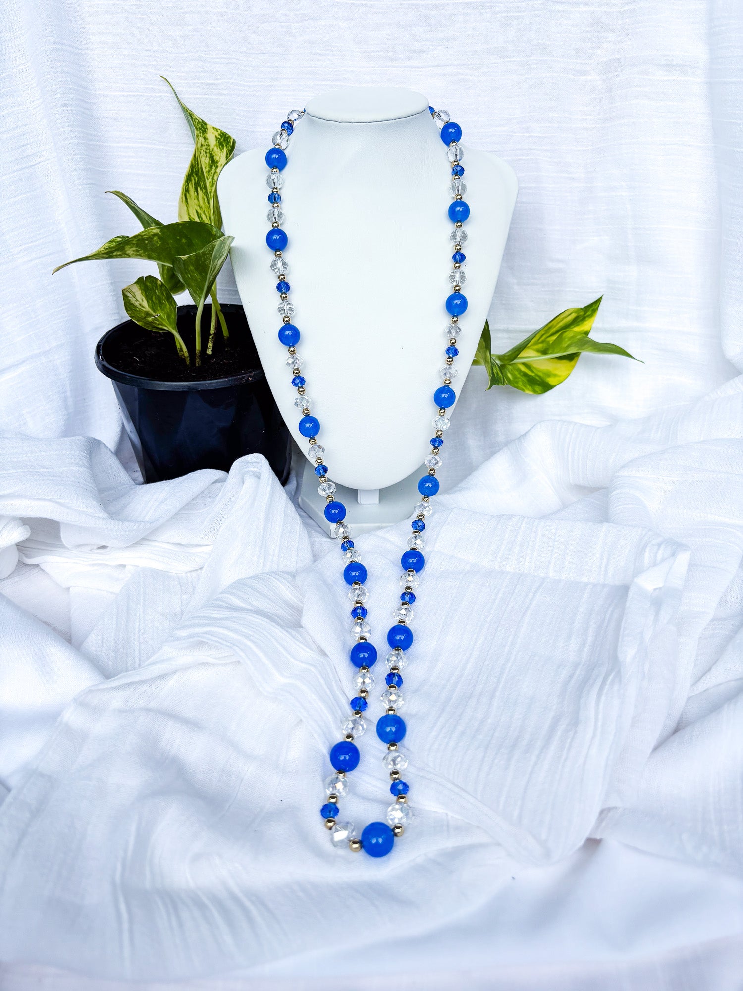 Handmade blue and clear faceted long Crystal Beaded Necklace with gold spacer beads - Beadsmith