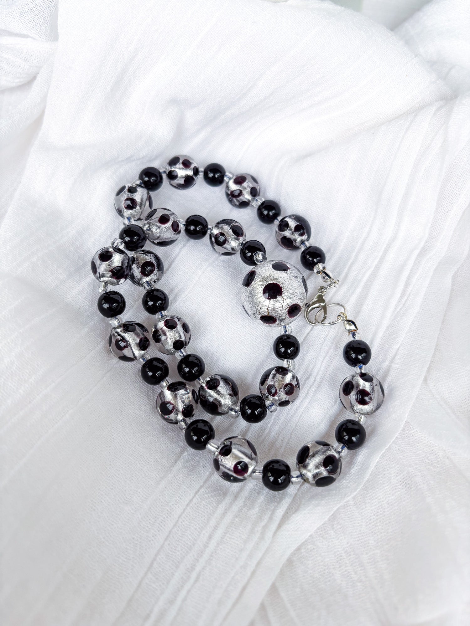 Handmade Black and Silver foil necklace with a stunning large feature bead - Beadsmith