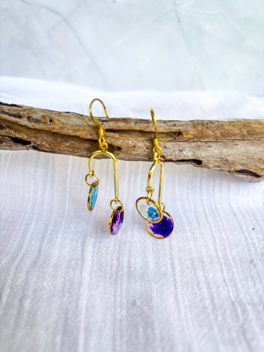 Gold rings with blue and purple resin discs - Beadsmith