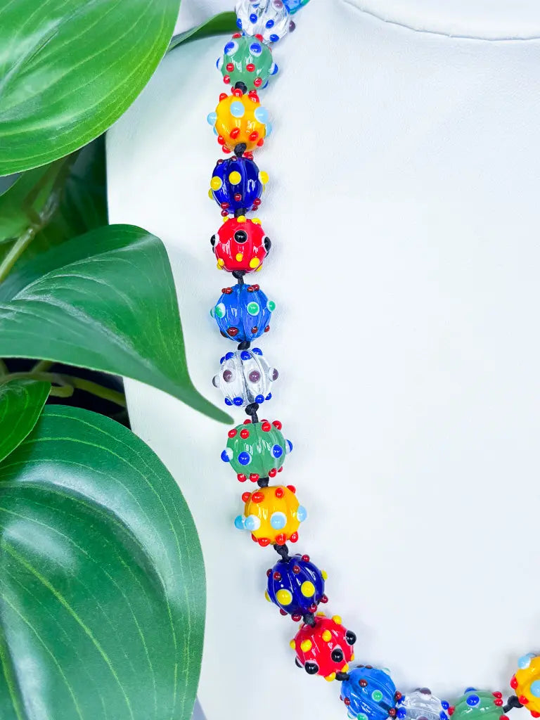 Round and blue rainbow spikey beaded necklace - Beadsmith